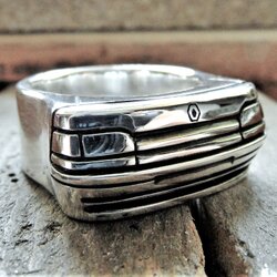 Handcrafted sterling silver statement ring inspired by a classic Renault front design