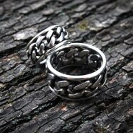 Handcrafted 925 sterling silver wedding rings with chain-inspired design and oxidized finish