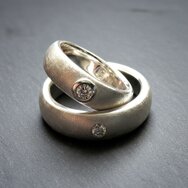 Handcrafted 925 sterling silver wedding rings with diamonds and matte finish