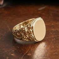 Handmade 585 gold baroque signet ring with ornate details and oval face