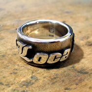 Handcrafted 925 sterling silver band ring with raised LOVE lettering and oxidized details