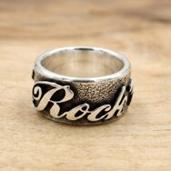 Handcrafted 925 sterling silver band ring with raised Rock ’n’ Roll lettering and oxidized details