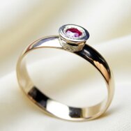 Handcrafted 14k yellow gold ring with vivid ruby in a bezel setting