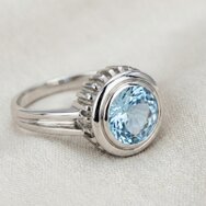 Handcrafted white gold ring with large round aquamarine gemstone