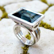Handcrafted 925 sterling silver ring with rectangular blue-green tourmaline and triple-band design