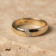 Handcrafted 14k yellow gold ring with diagonally set diamonds