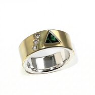Handcrafted gold ring with green trilliant-cut tourmaline and three flush-set diamonds